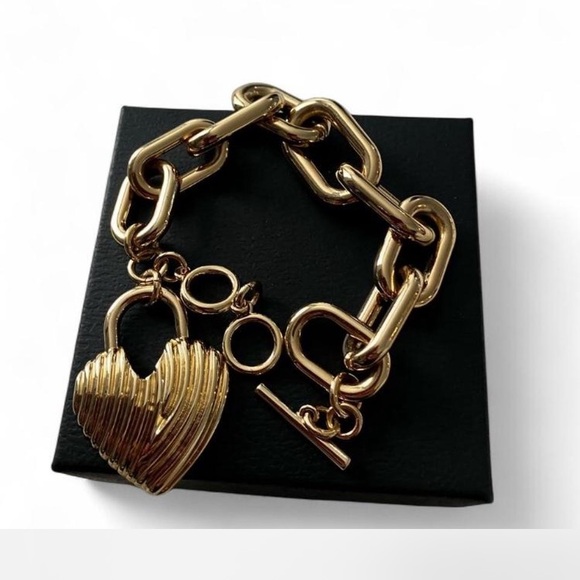 Gold Heart Charm Bracelet. Add a touch of flair to your basic look. - Picture 2 of 8